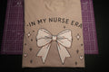 In My Nurse Era Shirt | Coquette Nurse Tee | Cute RN Shirt | Pink Bow Nurse Shirt | Nursing Student Gift | Bella Canvas Tee